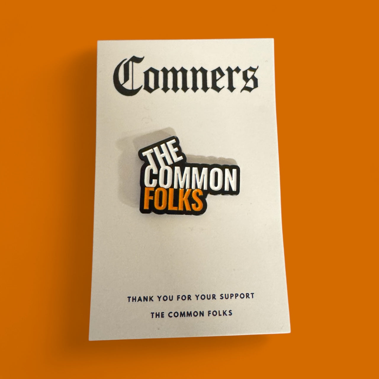 Comners Enamel Pin