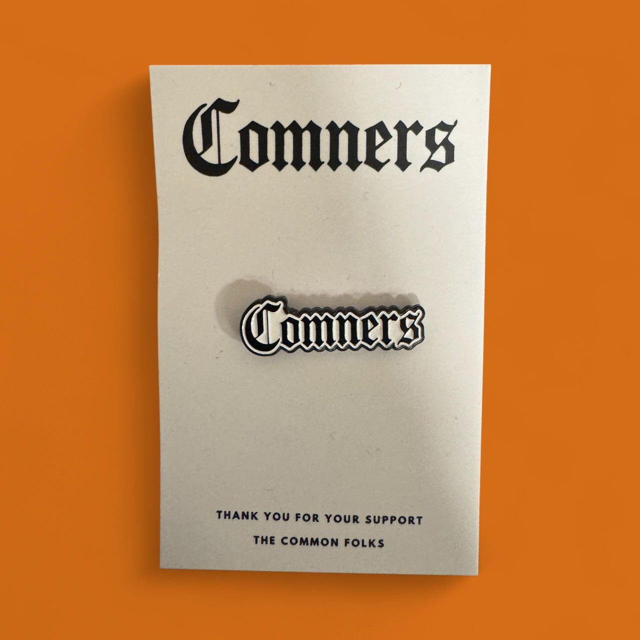Comners Enamel Pin